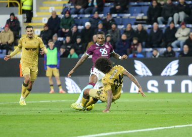 Kristal Saray 'dan Chris Richards, Burnley' li Jaidon Anthony 'nin 3 Aralık 2025' te Turf Moor, Burnley, İngiltere 'de oynanan Premier Lig maçı sırasında Kristal Saray' a karşı oynadığı maçı izledi. 