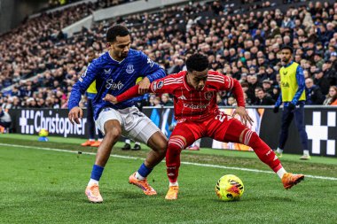 Omari Hutchinson of Nottingham Forest holds off Iliman Ndiaye of Everton during the Premier League match Everton vs Nottingham Forest at Hill Dickinson Stadium, Liverpool, United Kingdom, 6th December 2025 