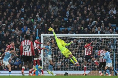 Manchester City goalkeeper Gianluigi Donnarumma makes a save during the Premier League match Manchester City vs Sunderland at Etihad Stadium, Manchester, United Kingdom, 6th December 2025 
