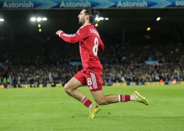 Liverpool 'dan Dominik Szoboszlai, Premier League maçında 6 Aralık 2025' te Leeds Road, Leeds, İngiltere 'de Liverpool' a karşı oynanan maçta 2-3 'lük galibiyet golünü kutluyor. 