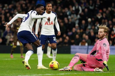 Caoimhn Kelleher of Brentford saves Pape Matar Sarr of Tottenham Hotspur shot from close range during the Premier League match Tottenham Hotspur vs Brentford at Tottenham Hotspur Stadium, London, United Kingdom, 6th December 2025 
