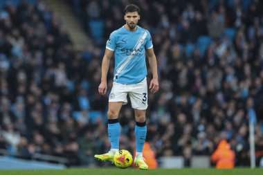 Ruben Dias of Manchester City with the ball during the Premier League match Manchester City vs Sunderland at Etihad Stadium, Manchester, United Kingdom, 6th December 2025 