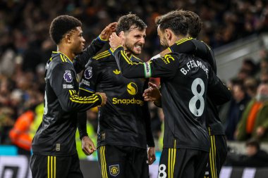 Manchester Untie 'den Mason Mount Premier League maçında Wolverhampton Wanderers, Manchester United' a karşı 8 Aralık 2025 'te Molineux, Wolverhampton, Birleşik Krallık' ta 1-3 kazanma golünü kutluyor. 