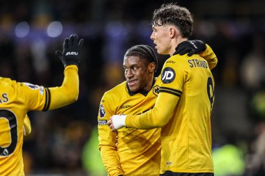 Wolverhampton Wanderers 'dan Jean-Ricner Bellegarde, 8 Aralık 2025' te İngiltere 'nin Molineux kentinde oynanan Premier League maçında Wolverhampton Wanderers ile Manchester United arasındaki maçı 1-1 kazanma golünü kutluyor. 