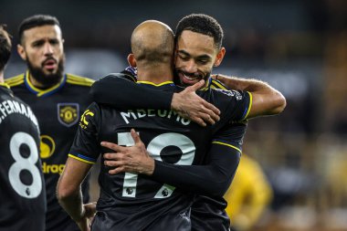 Manchester Untie 'den Bryan Mbeumo, Premier League maçında Wolverhampton Wanderers' ın Manchester United 'a karşı 8 Aralık 2025' te oynanan Molineux, Wolverhampton, Birleşik Krallık maçında 1-2 'lik galibiyet golünü kutluyor. 