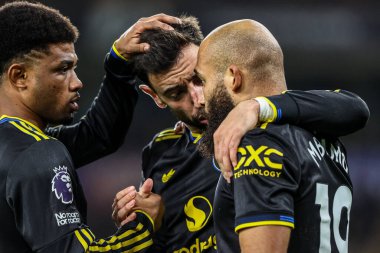 Manchester Untie 'den Bryan Mbeumo, Premier League maçında Wolverhampton Wanderers' ın Manchester United 'a karşı 8 Aralık 2025' te oynanan Molineux, Wolverhampton, Birleşik Krallık maçında 1-2 'lik galibiyet golünü kutluyor. 