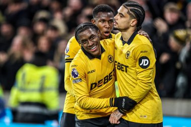 Wolverhampton Wanderers 'dan Jean-Ricner Bellegarde, 8 Aralık 2025' te İngiltere 'nin Molineux kentinde oynanan Premier League maçında Wolverhampton Wanderers ile Manchester United arasındaki maçı 1-1 kazanma golünü kutluyor. 