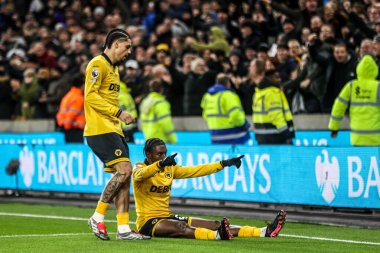 Wolverhampton Wanderers 'dan Jean-Ricner Bellegarde, 8 Aralık 2025' te İngiltere 'nin Molineux kentinde oynanan Premier League maçında Wolverhampton Wanderers ile Manchester United arasındaki maçı 1-1 kazanma golünü kutluyor. 