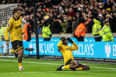 Wolverhampton Wanderers 'dan Jean-Ricner Bellegarde, 8 Aralık 2025' te İngiltere 'nin Molineux kentinde oynanan Premier League maçında Wolverhampton Wanderers ile Manchester United arasındaki maçı 1-1 kazanma golünü kutluyor. 