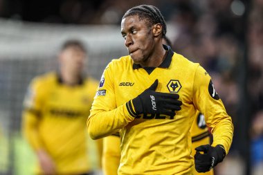 Wolverhampton Wanderers 'dan Jean-Ricner Bellegarde, 8 Aralık 2025' te İngiltere 'nin Molineux kentinde oynanan Premier League maçında Wolverhampton Wanderers ile Manchester United arasındaki maçı 1-1 kazanma golünü kutluyor. 