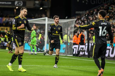 Manchester Untie 'den Mason Mount Premier League maçında Wolverhampton Wanderers, Manchester United' a karşı 8 Aralık 2025 'te Molineux, Wolverhampton, Birleşik Krallık' ta 1-3 kazanma golünü kutluyor. 