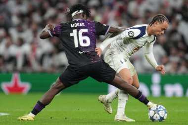 David Moses of Slavia Prague attempts to win ball off Xavi Simons of Tottenham Hotspur during the UEFA Champions League Matchday 6 of 8 Tottenham Hotspur vs Slavia Prague at Tottenham Hotspur Stadium, London, United Kingdom, 9th December 2025 
