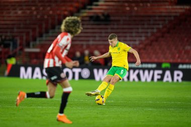 Jakov Medi of Norwich City crosses the ball as Tahith Chong of Sheffield United looks to close him down during the Sky Bet Championship match Sheffield United vs Norwich City at Bramall Lane, Sheffield, United Kingdom, 9th December 2025 