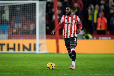 Sheffield United takımından Japhet Tanganga, 9 Aralık 2025 'te İngiltere' nin Bramall Lane kentinde oynanan Sheffield United Norwich City maçında topla hareket ediyor. 