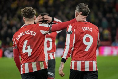 Sheffield United oyuncuları, Sheffield United 'ın açılış golünü 9 Aralık 2025' te Bramall Lane, Sheffield, İngiltere 'de Sheffield United' a karşı Norwich City maçında kutladı. 