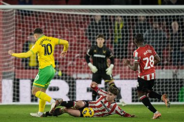 Sheffield United oyuncusu Norwich City 'den Matj Jursek' i, 9 Aralık 2025 'te Bramall Lane, Sheffield, İngiltere' de oynanan Sky Bet Şampiyonası maçında topu kazanmak için kaydırdı. 