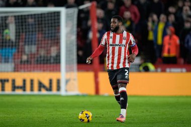 Japhet Tanganga of Sheffield United moves with the ball during the Sky Bet Championship match Sheffield United vs Norwich City at Bramall Lane, Sheffield, United Kingdom, 9th December 2025 