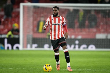 Sheffield United takımından Japhet Tanganga, 9 Aralık 2025 'te Bramall Lane, Sheffield, İngiltere' de oynanan Sheffield United Norwich City maçında topu sürüyor. 