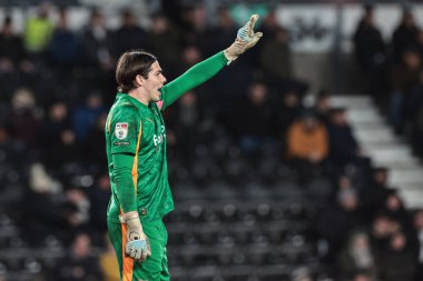 Derby County goalkeeper Jacob Widell Zetterstrom gives his team instructions during the Sky Bet Championship match Derby County vs Millwall at Pride Park Stadium, Derby, United Kingdom, 10th December 2025