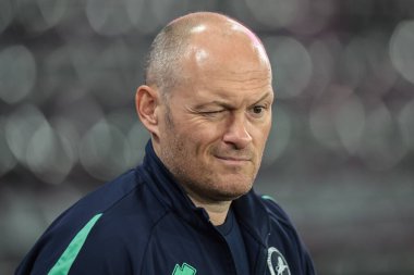 Alex Neil manager of Millwall winks at his players as he arrives during the Sky Bet Championship match Derby County vs Millwall at Pride Park Stadium, Derby, United Kingdom, 10th December 2025