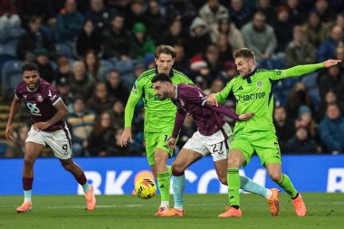 Armando Broja of Burnley and Joachim Andersen of Fulham battle for the ball during the Premier League match Burnley vs Fulham at Turf Moor, Burnley, United Kingdom, 13th December 2025