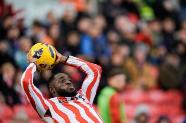 Junior Tchamadeu of Stoke City prepares to throw the ball in during the Sky Bet Championship match Stoke City vs Swansea City at Bet365 Stadium, Stoke-on-Trent, United Kingdom, 13th December 2025