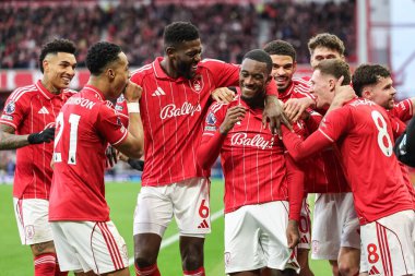 Callum Hudson-Odoi of Nottingham Forest celebrates his goal to make it 2-0 with team mates during the Premier League match Nottingham Forest vs Tottenham Hotspur at City Ground, Nottingham, United Kingdom, 14th December 2025