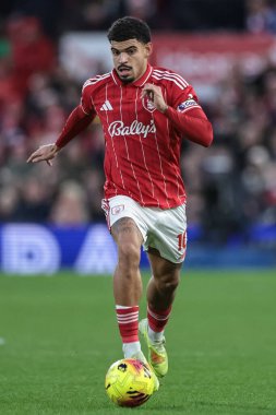 Morgan Gibbs-White of Nottingham Forest breaks with the ball during the Premier League match Nottingham Forest vs Tottenham Hotspur at City Ground, Nottingham, United Kingdom, 14th December 2025