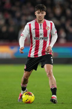 Aaron Hickey of Brentford on the ball during the Premier League match Brentford vs Leeds United at The Gtech Community Stadium, London, United Kingdom, 14th December 2025