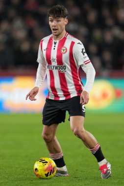 Aaron Hickey of Brentford on the ball during the Premier League match Brentford vs Leeds United at The Gtech Community Stadium, London, United Kingdom, 14th December 2025