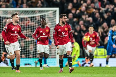 Manchester Untie 'den Bruno Fernandes, 15 Aralık 2025' te Old Trafford, Manchester, İngiltere 'de oynanan Premier League maçında 3-3' lük galibiyet golünü kutluyor.