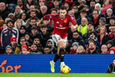Diogo Dalot of Manchester Untied breaks with the ball during the Premier League match Manchester United vs Bournemouth at Old Trafford, Manchester, United Kingdom, 15th December 2025