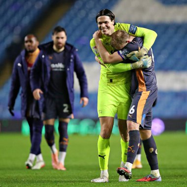 Jacob Widell Zetterstrom of Derby County and Sondre Langas of Derby County after the Sky Bet Championship match Sheffield Wednesday vs Derby County at Hillsborough, Sheffield, United Kingdom, 15th December 2025