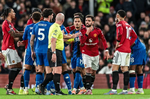 Bruno Fernandes of Manchester Untied gestures towards referee Simon Hooper about an incident during the game during the Premier League match Manchester United vs Bournemouth at Old Trafford, Manchester, United Kingdom, 15th December 2025