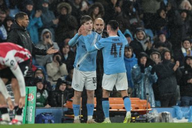 Charlie Gray of Manchester City come on for Phil Foden of Manchester City during the Carabao Cup Quarter Final match Manchester City vs Brentford at Etihad Stadium, Manchester, United Kingdom, 17th December 2025