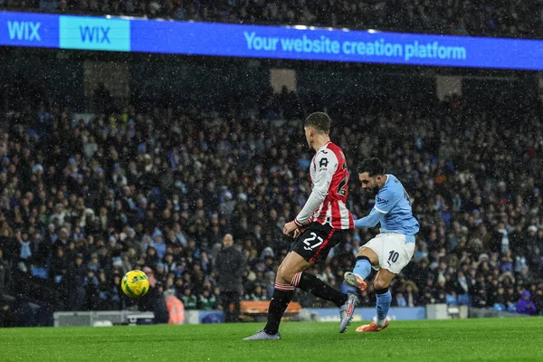 Rayan Cherki of Manchester City shoots on goal during the Carabao Cup Quarter Final match Manchester City vs Brentford at Etihad Stadium, Manchester, United Kingdom, 17th December 2025