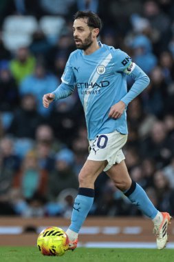 Bernardo Silva of Manchester City breaks with the ball during the Premier League match Manchester City vs West Ham United at Etihad Stadium, Manchester, United Kingdom, 20th December 2025