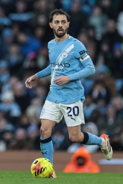 Bernardo Silva of Manchester City breaks with the ball during the Premier League match Manchester City vs West Ham United at Etihad Stadium, Manchester, United Kingdom, 20th December 2025