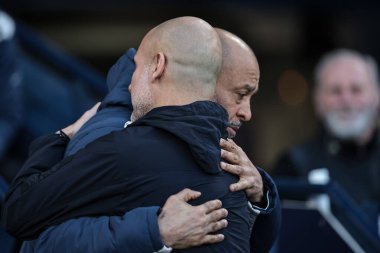 Pep Guardiola manager of Manchester City embraces Nuno Espirito Santo manager of West Ham United during the Premier League match Manchester City vs West Ham United at Etihad Stadium, Manchester, United Kingdom, 20th December 2025
