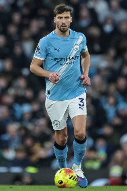 Manchester City 'den Ruben Dias, 20 Aralık 2025' te Etihad Stadyumu 'nda Manchester City ile West Ham United arasındaki Premier Lig karşılaşmasında topu aldı.