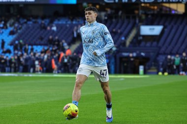 Manchester City 'den Phil Foden Premier League maçında ısınma turunda Manchester City ile West Ham United arasında Etihad Stadyumu, Manchester, İngiltere, 20 Aralık 2025