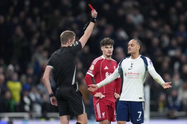Referee John Brooks sends off Xavi Simons of Tottenham Hotspur after var decision during the Premier League match Tottenham Hotspur vs Liverpool at Tottenham Hotspur Stadium, London, United Kingdom, 20th December 2025