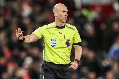Referee Anthony Taylor gives instructions during the Premier League match Manchester United vs Newcastle United at Old Trafford, Manchester, United Kingdom, 26th December 2025