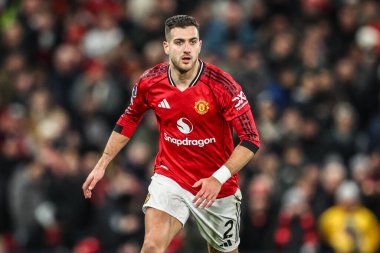 Manchester United - Newcastle United Premier League maçı sırasında Manchester Untie 'den Diogo Dalot 26 Aralık 2025' te Old Trafford, Manchester, İngiltere 'de karşı karşıya geldi.