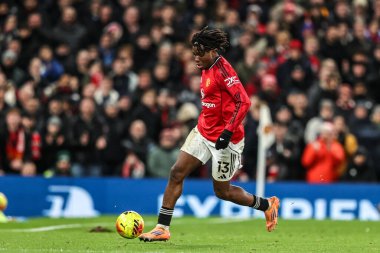 Manchester United ve Newcastle United 'ın 26 Aralık 2025' te Old Trafford, Manchester, İngiltere 'de oynadığı Premier League maçında untie' li Patrick Dorgu karşı karşıya geldi.