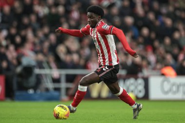 Sunderland 'dan Eliezer Mayenda, 28 Aralık 2025' te İngiltere 'nin Sunderland kentinde oynanan Premier Lig karşılaşmasında Sunderland-Leeds United maçında topa vuruyor.