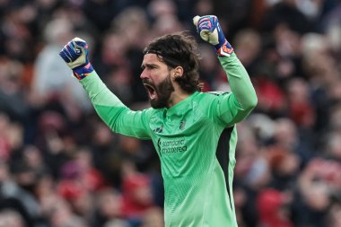 Liverpool 'dan Alisson Becker, 27 Aralık 2025' te İngiltere 'nin Liverpool kentinde oynanan Premier League maçında Wolverhampton Wanderers' a karşı oynanan golü kutluyor.