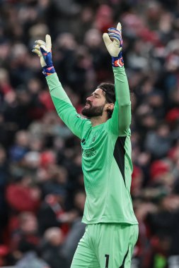 Liverpool 'dan Alisson Becker, 27 Aralık 2025' te İngiltere 'nin Liverpool kentinde oynanan Premier League maçında Wolverhampton Wanderers' a karşı oynanan golü kutluyor.