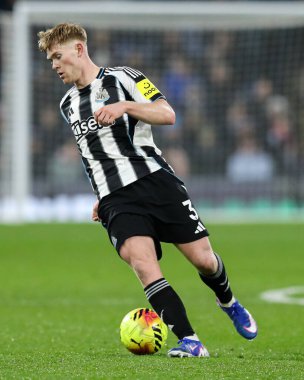 Lewis Hall of Newcastle United controls the ball during the Premier League match Burnley vs Newcastle United at Turf Moor, Burnley, United Kingdom, 30th December 2025