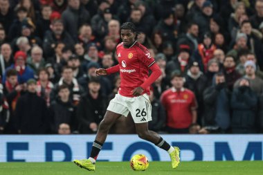 Manchester United 'ın Ayden Heavenm' i Premier League maçında Manchester United ile Wolverhampton Wanderers 'ın 30 Aralık 2025' te Old Trafford, Manchester 'da karşı karşıya geldiği maçta topu aldı.